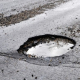 Assicurazione auto, risarcimento danni da buche stradali: Comune deve pagare